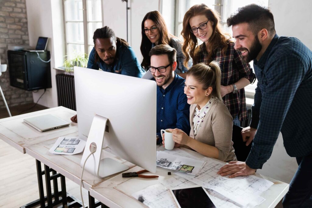 How to Choose the Right CMS for Your Website (2026) 4 young architects working on project in office 2023 11 27 05 31 57 utc 1 scaled 1