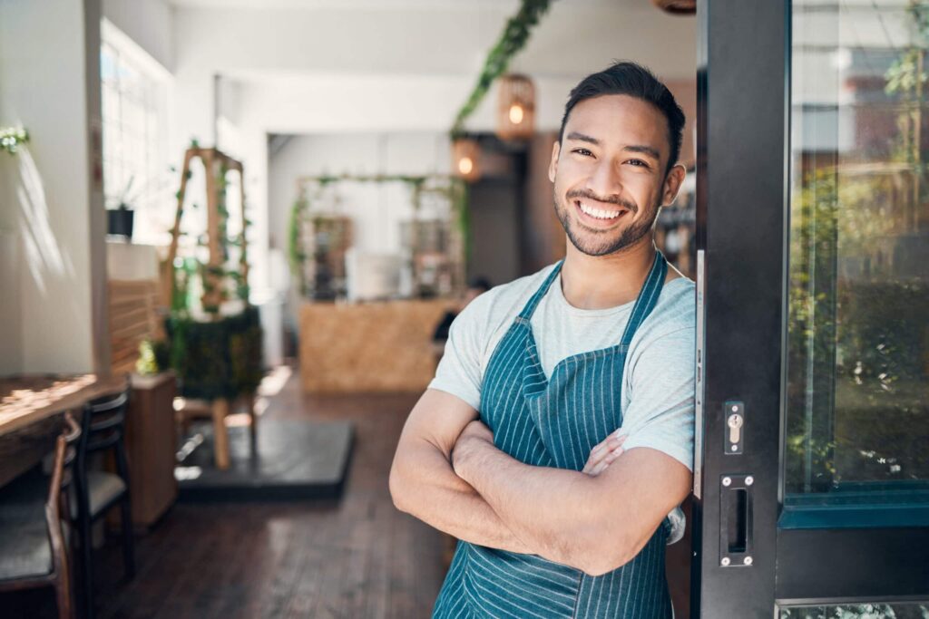 portrait of one happy young hispanic waiter standi 2026 01 09 11 20 16 utc scaled 1