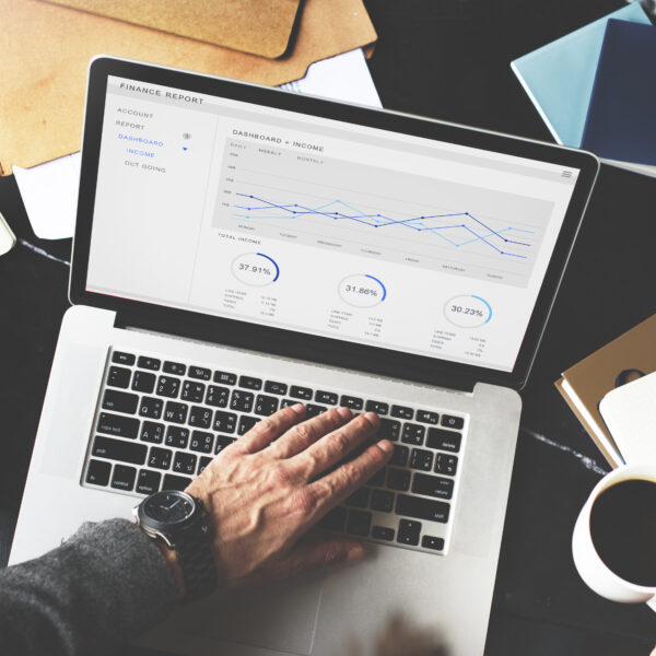 marketer planning a social media marketing strategy on a content calendar