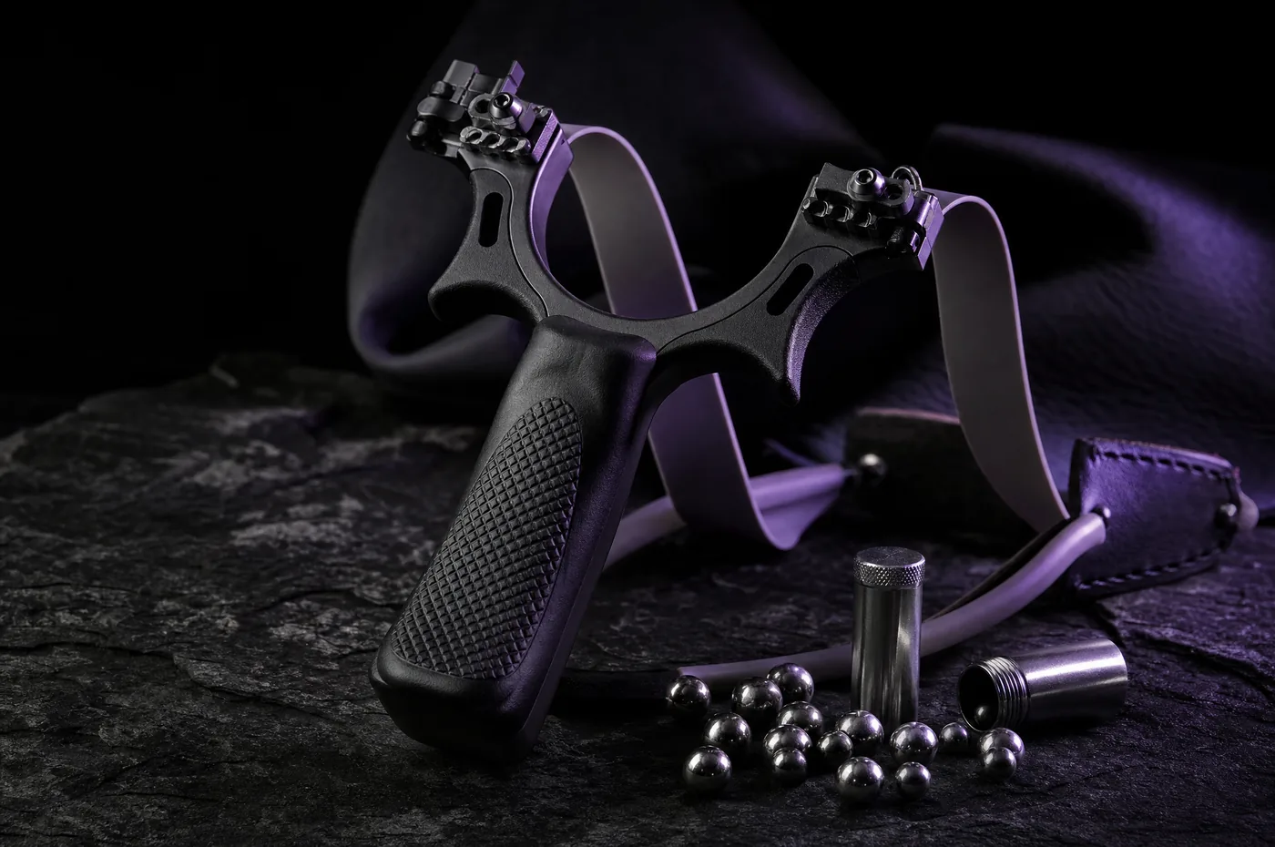 Precision outdoor sporting equipment in dramatic lighting
